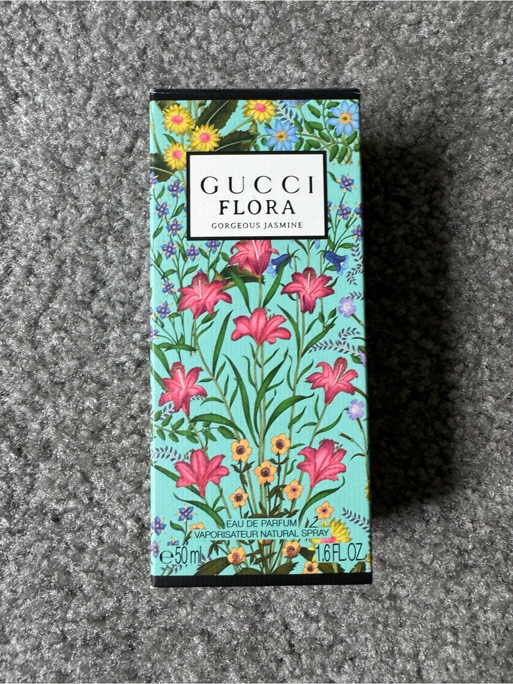 Gucci, Kilian, and Kate Spade boxes